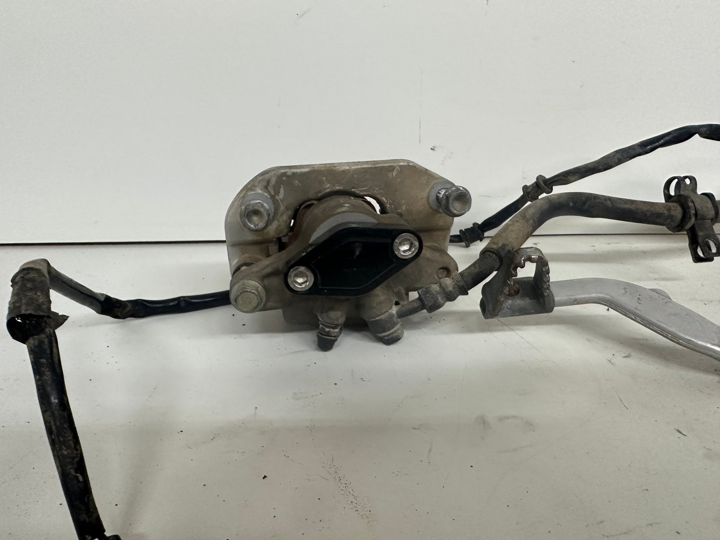 2005 HONDA TRX450R REAR BRAKE ASSEMBLY