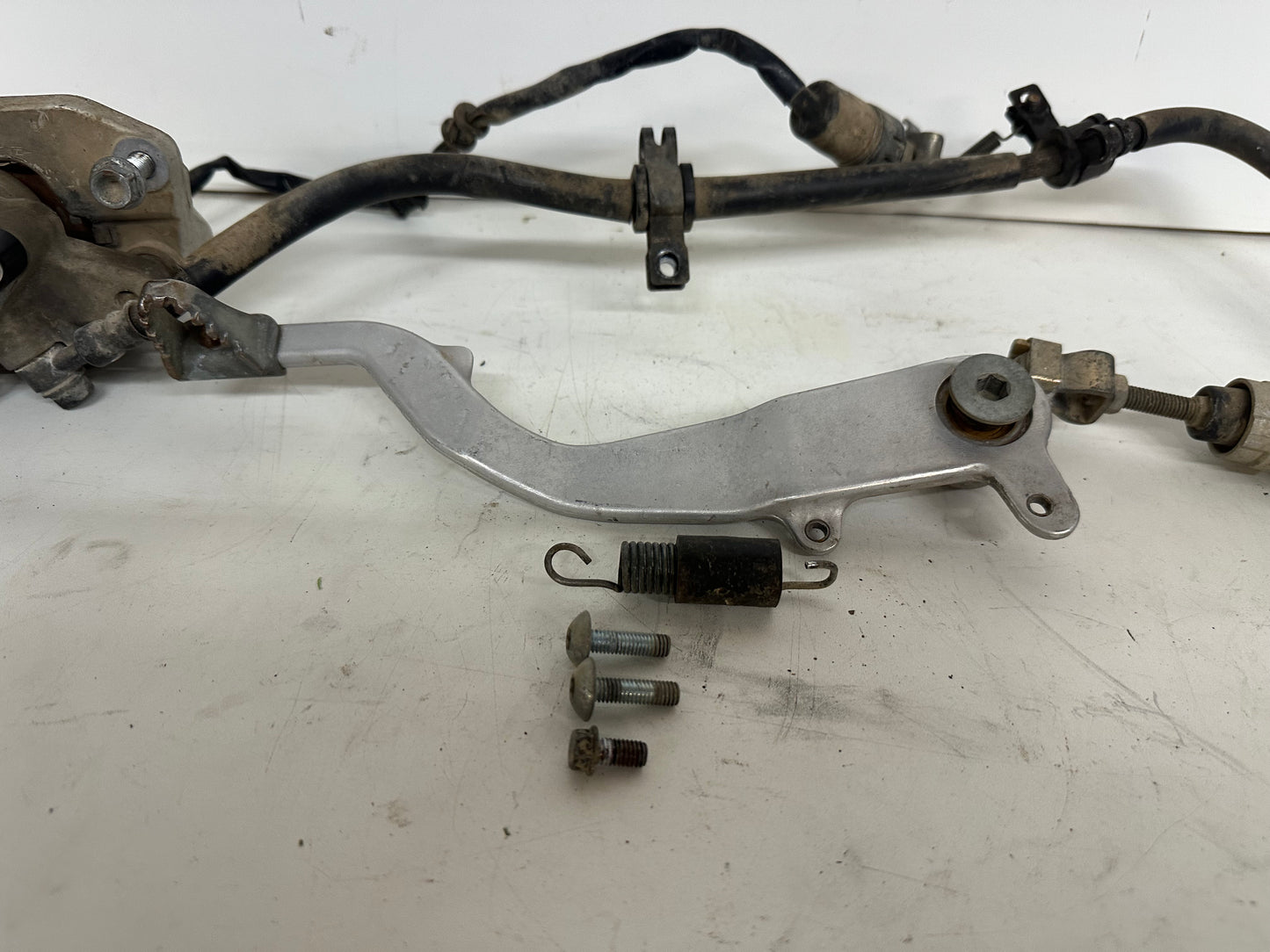 2005 HONDA TRX450R REAR BRAKE ASSEMBLY
