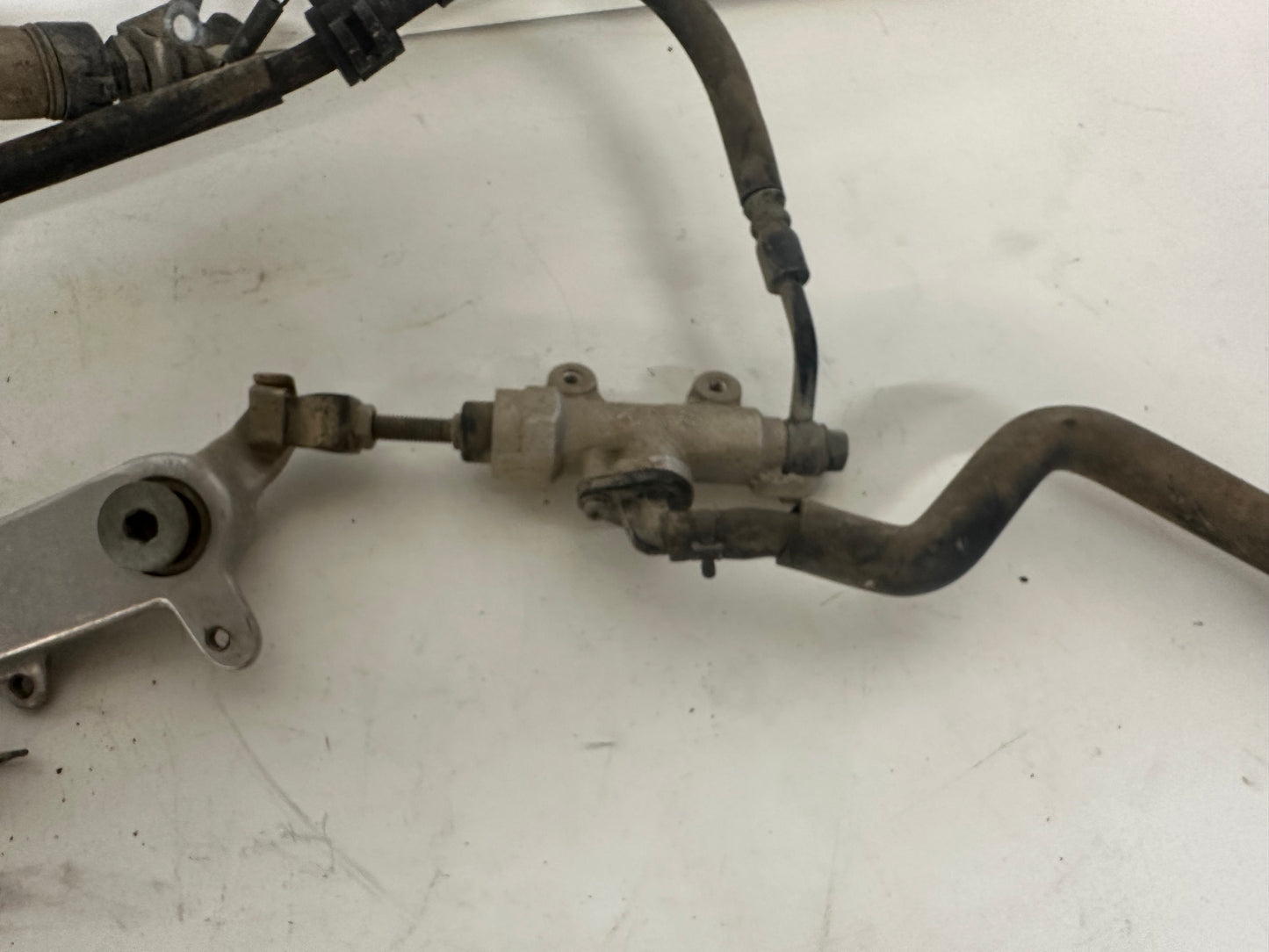 2005 HONDA TRX450R REAR BRAKE ASSEMBLY